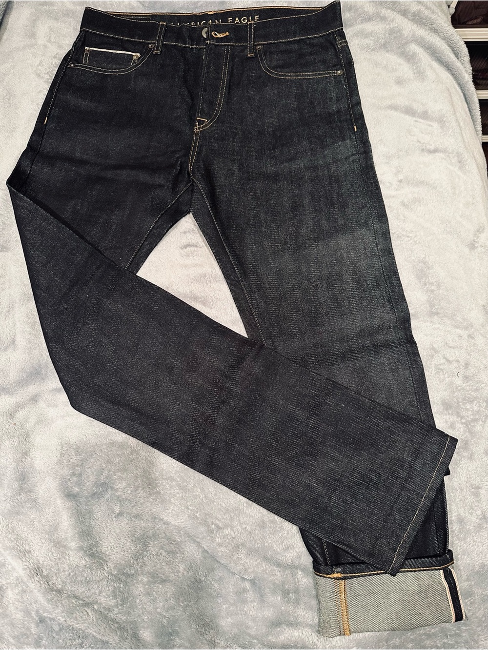 American Eagle Outfitters Dark Indigo Jeans with Tan Stitching